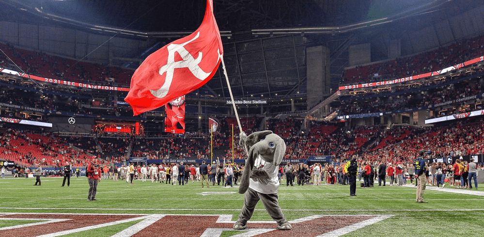 Alabama Football team mascot waves flag