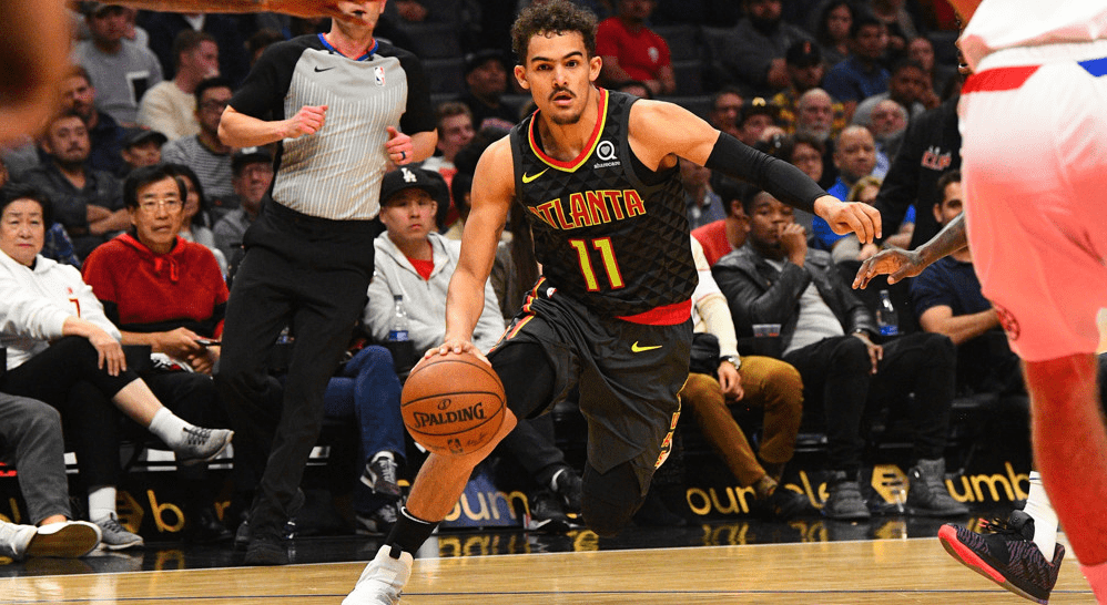 Trae Young of the Atlanta Hawks attempts to pass NBA Player Props