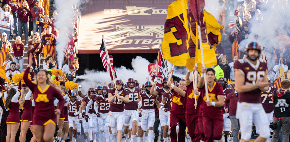 Minnesota Golden Gophers Football runs on field