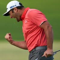 Golfer Jon Rahm celebrates