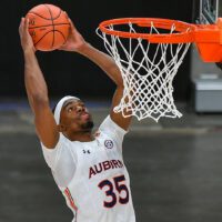 Auburn guard Devan Cambridge dunks the basketball