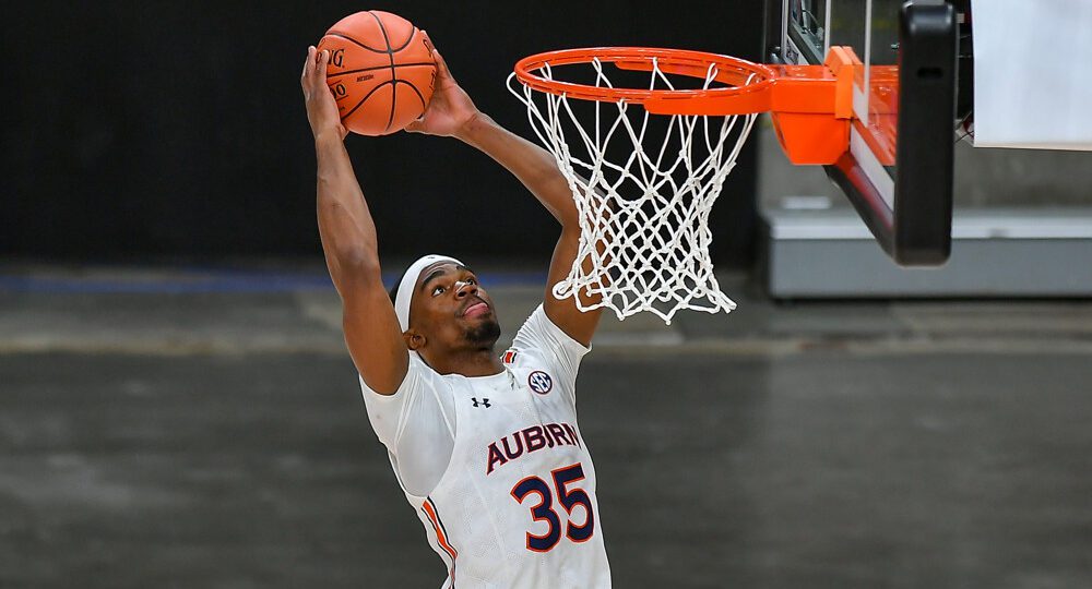 Auburn guard Devan Cambridge dunks the basketball