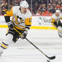 Pittsburgh Penguins Player Skates With Puck