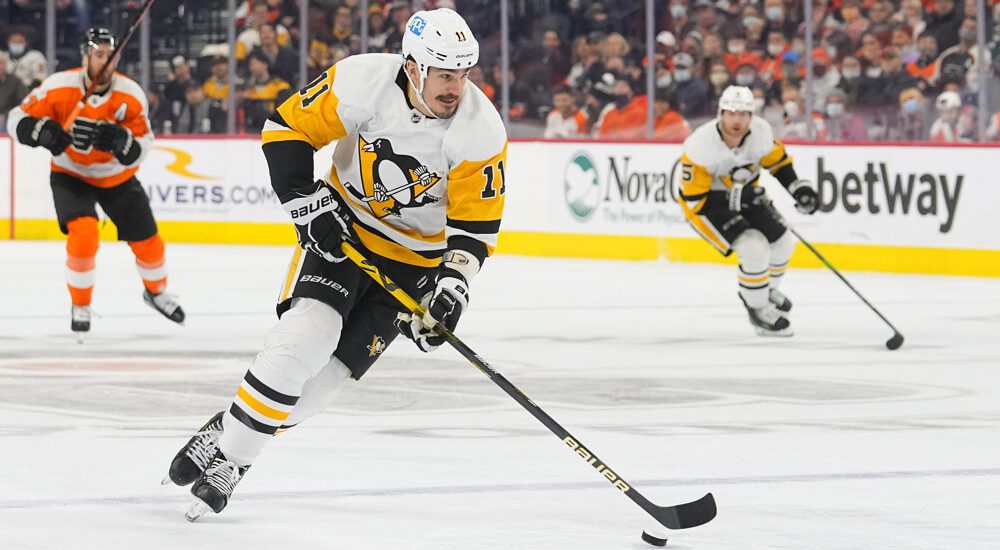 Pittsburgh Penguins Player Skates With Puck