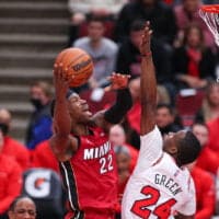 Jimmy Butler of Miami Heat attempts to hit NBA player props