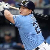 Rays Player Hits Baseball