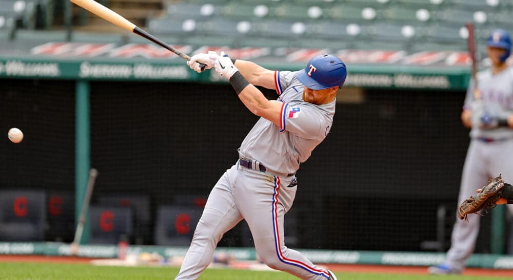 Texas Rangers Batter Hits Ball