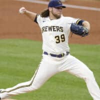 Corbin Burnes of Brewers pitches baseball