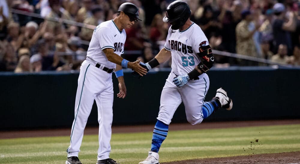 Christian Walker of Diamondbacks rounds bases after hitting home run