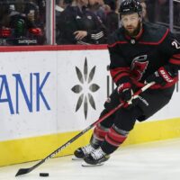 Hurricanes Player Skates With Puck