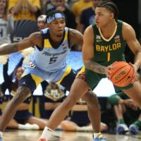 Baylor Bears player holds basketball