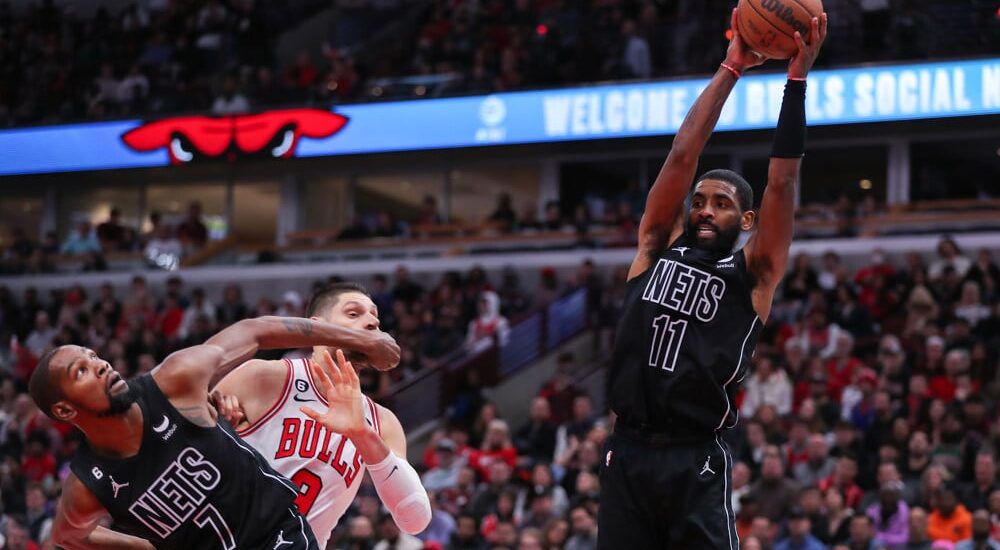 Kyrie Irving of Nets Grabs Rebound