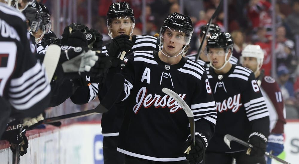 New Jersey Devils players celebrate after goal