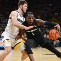 Portland State player dribbles in paint