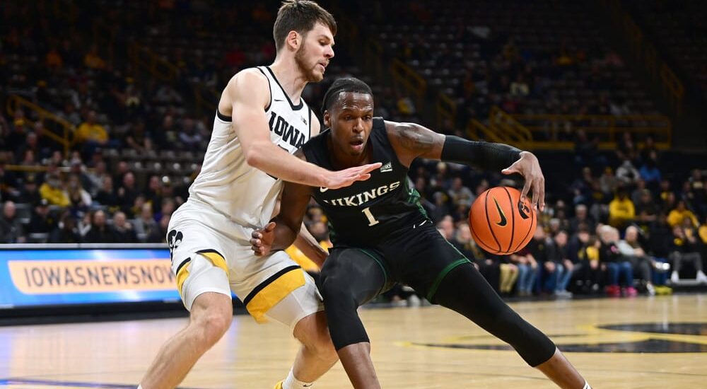 Portland State player dribbles in paint