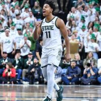 Michigan State player celebrates after play