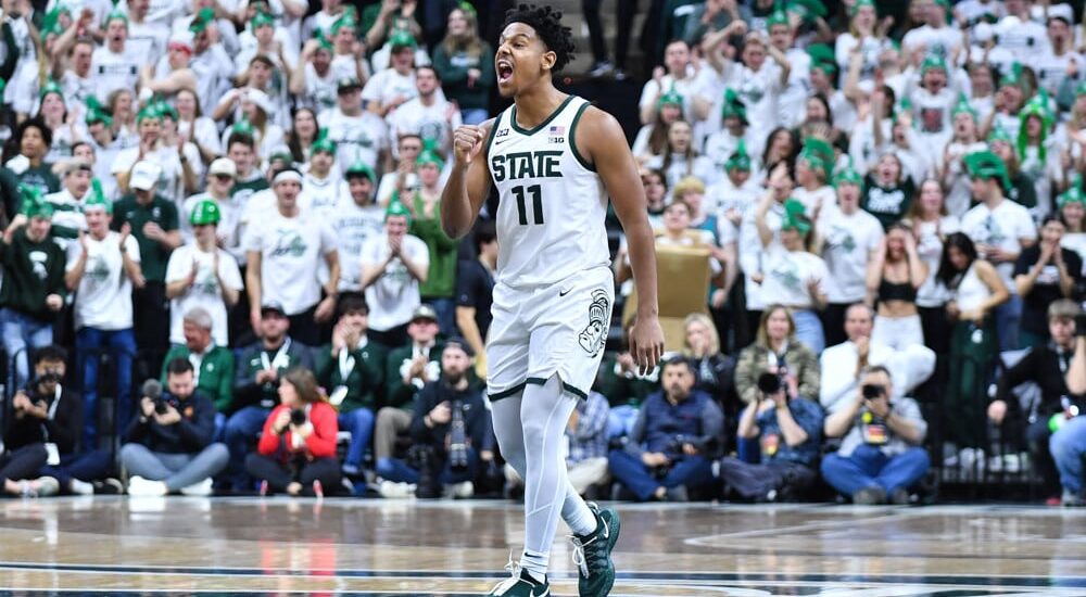 Michigan State player celebrates after play