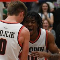 Brown players celebrate after play