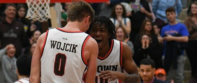 Brown players celebrate after play