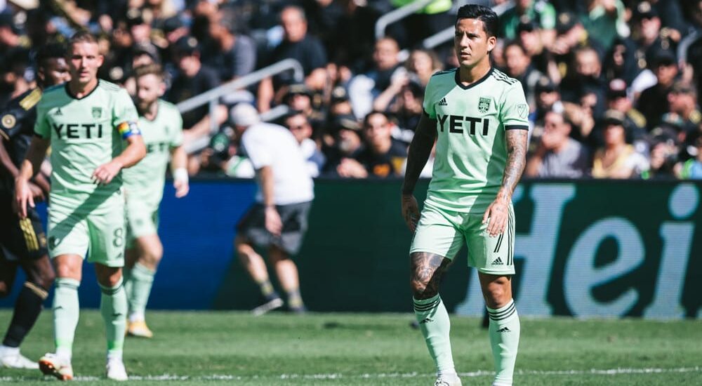 Austin FC players walk on field