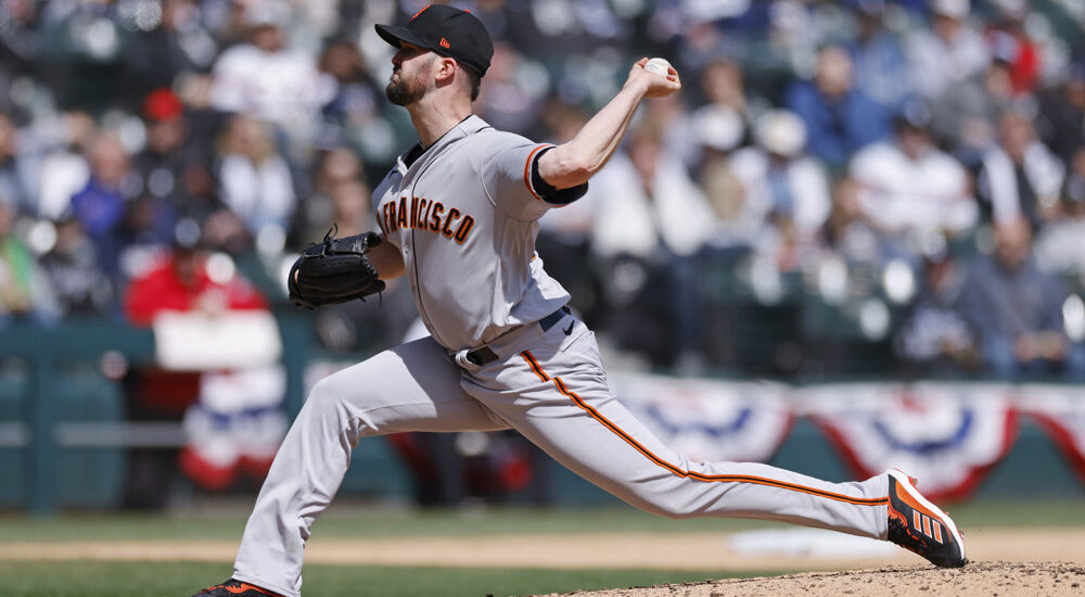 Alex Wood of Giants pitches baseball