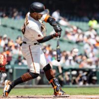 Thairo Estrada of San Francisco Giants hits baseball for a YRFI