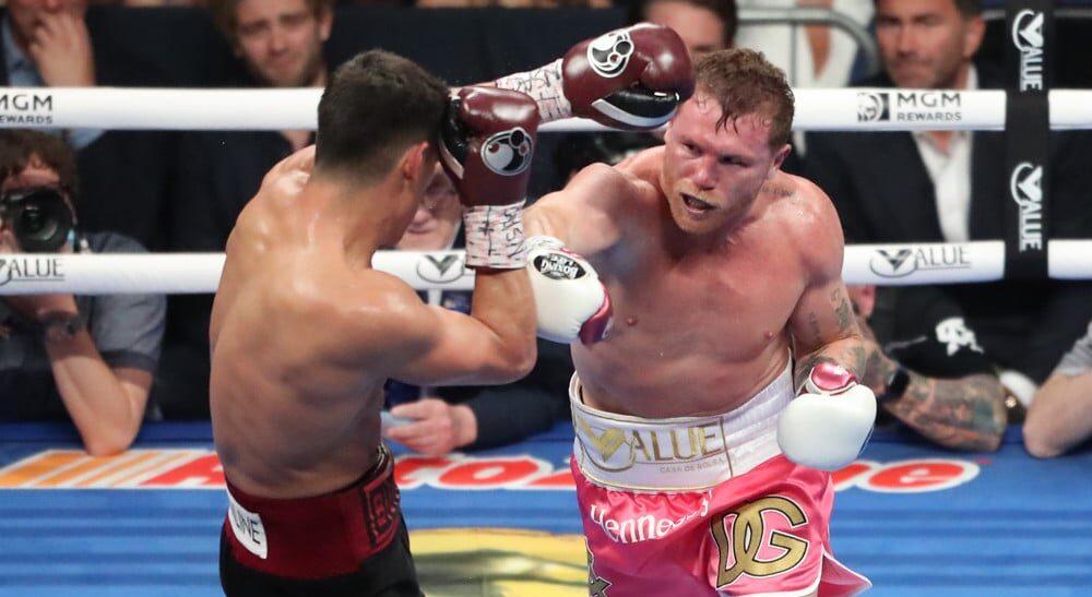 Canelo Alvarez punches opponent