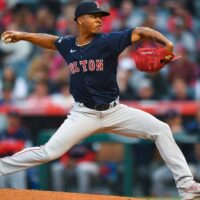 Brayan Bello of Red Sox records an out