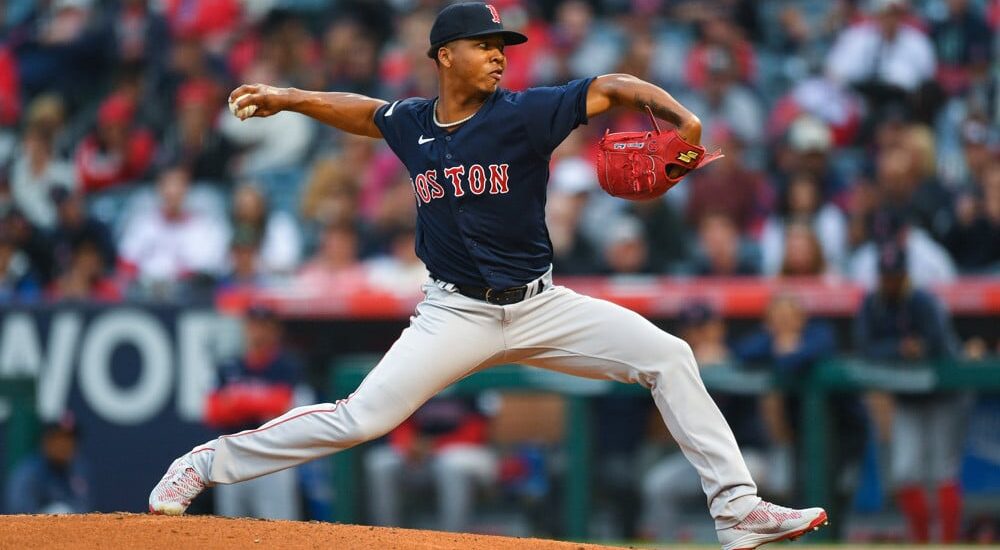 Brayan Bello of Red Sox records an out