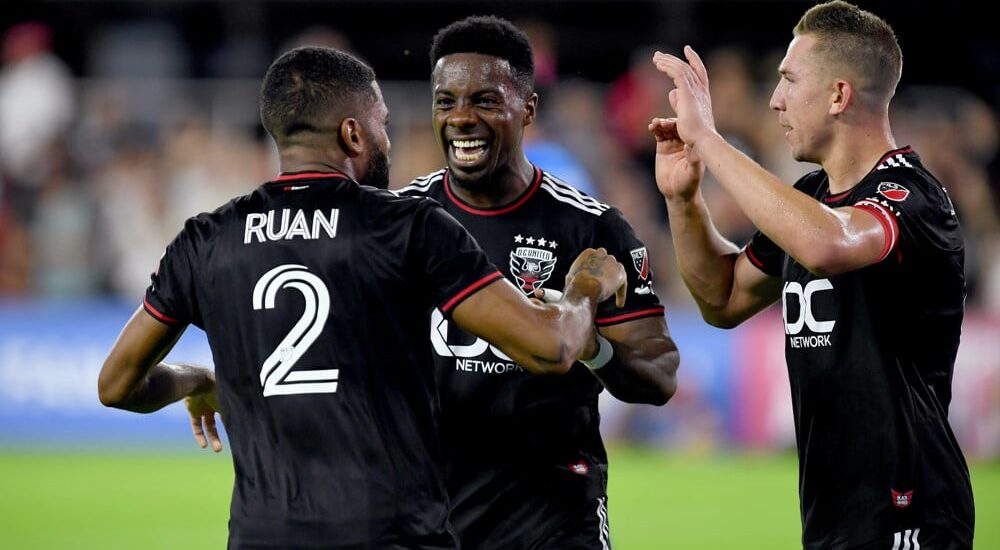 DC United players celebrate MLS goal