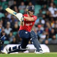 England Cricket player swings Cricket bat
