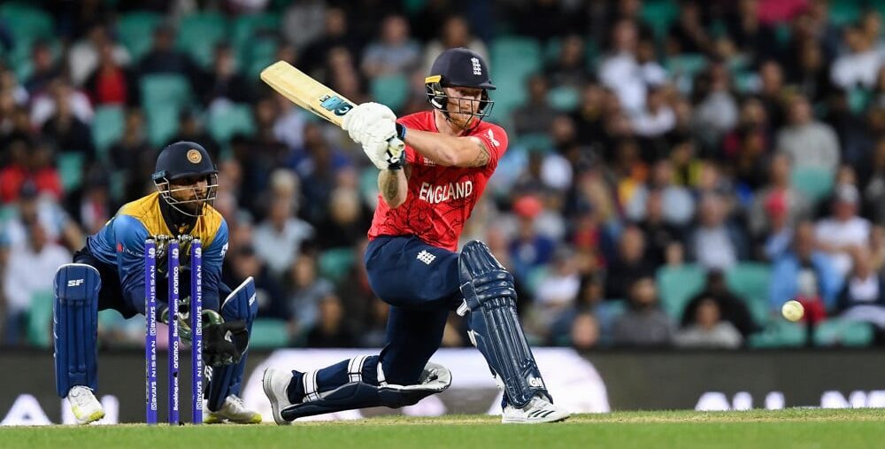 England Cricket player swings Cricket bat