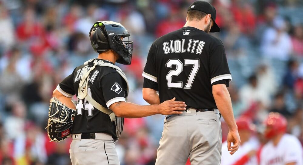 Lucas Giolito of White Sox talks with catcher