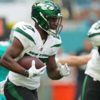 Jets running back Zonovan Knight carries NFL football