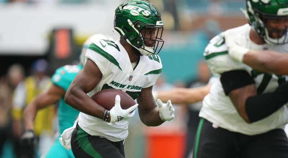 Jets running back Zonovan Knight carries NFL football