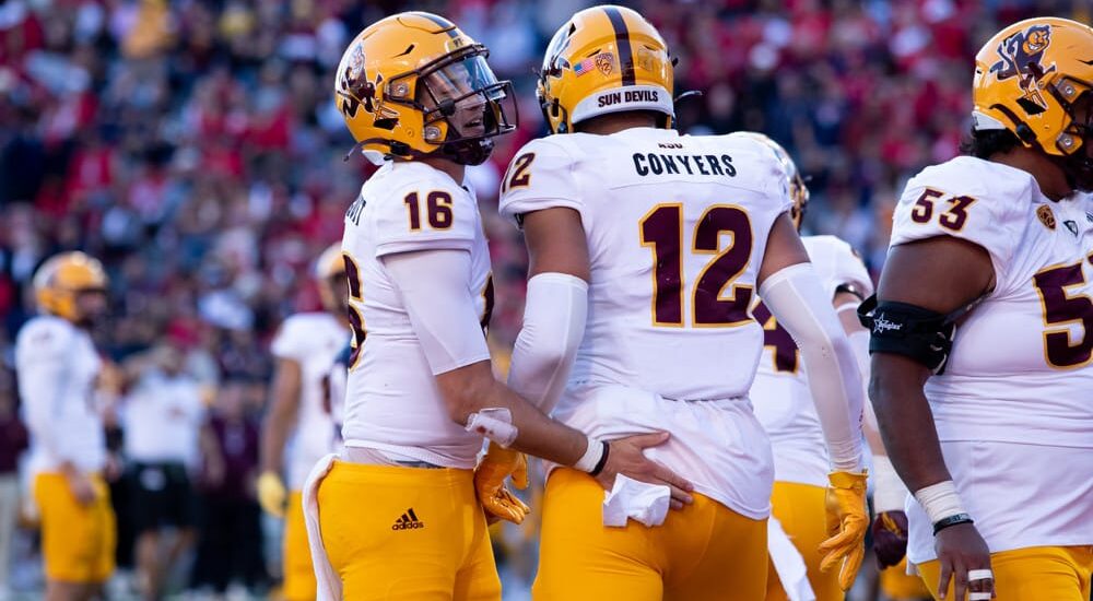 Arizona State Football quarterback and tight end celebrate play