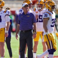 LSU Football coach Brian Kelly practices with players before LSU vs Mississippi State