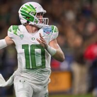 Oregon Football QB Bo Nix attempts to pass college football player props