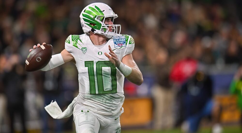 Oregon Football QB Bo Nix attempts to pass college football player props