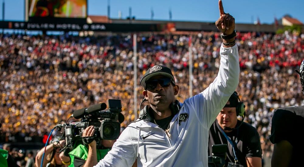 Colorado football coach celebrates before Colorado vs Colorado State