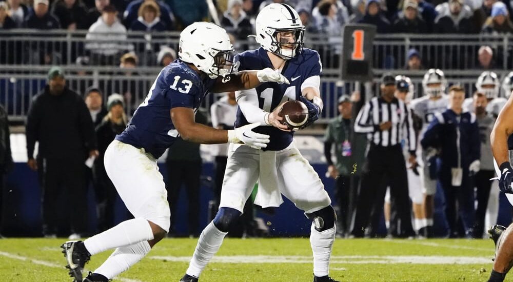 Penn State QB hands football off to RB