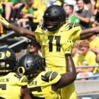 Troy Franklin celebrates after hitting college football player props