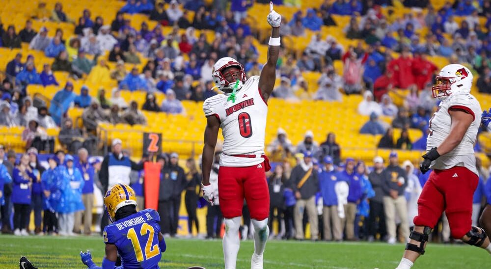 Chris Bell celebrates after passing College Football Player Props